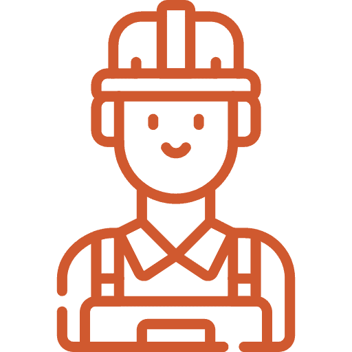 Construction worker wearing safety helmet and vest on site.